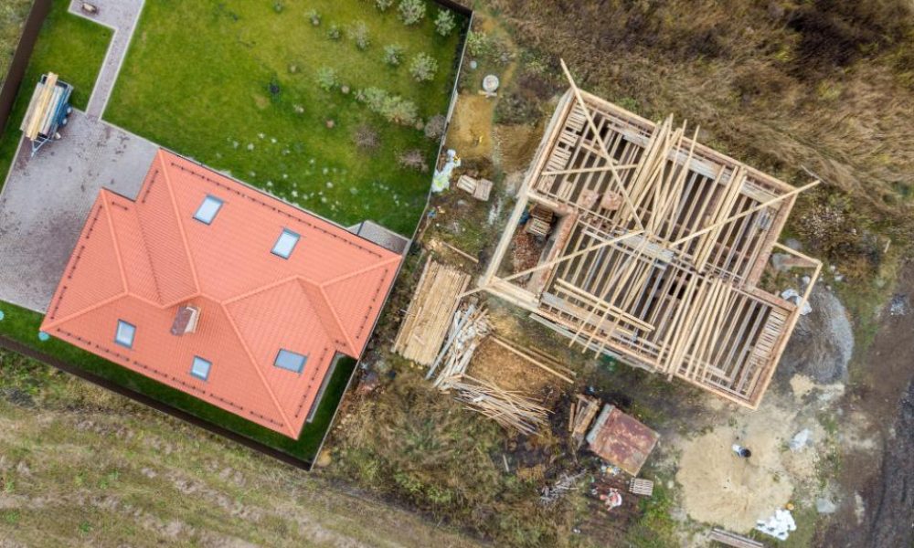 top-down-aerial-view-of-two-private-houses-one-un-2023-11-27-04-55-21-utc